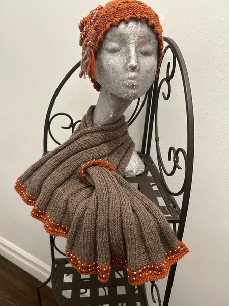 Set -  Gray knitted scarf with orange beaded border and matching orange  cloche  with pearl beads