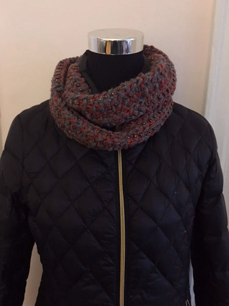 Knitted cowl in orange and blue-gray with seed beads