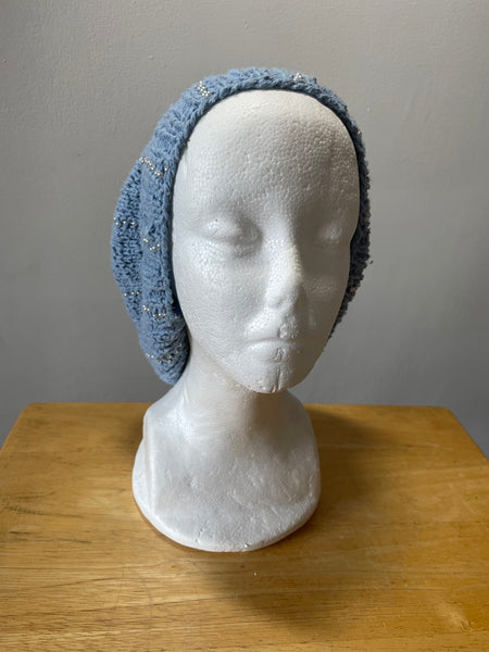 Knitted cotton and silk beanie in blue with silver seed beads