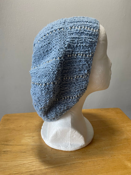 Knitted cotton and silk beanie in blue with silver seed beads