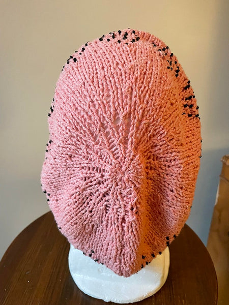 Knitted cotton and silk beanie in coral with black seed beads