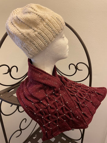 Set - Smocked cowl in cranberry plaid wool with seed beads and matching white knitted beanie