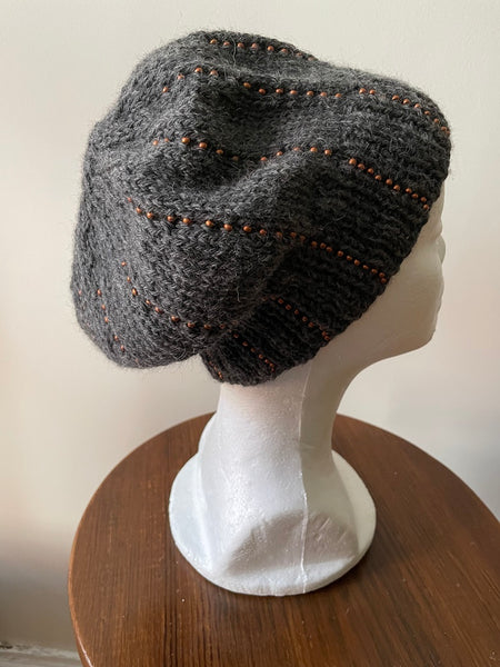 Gray knitted scarf with copper seed beads